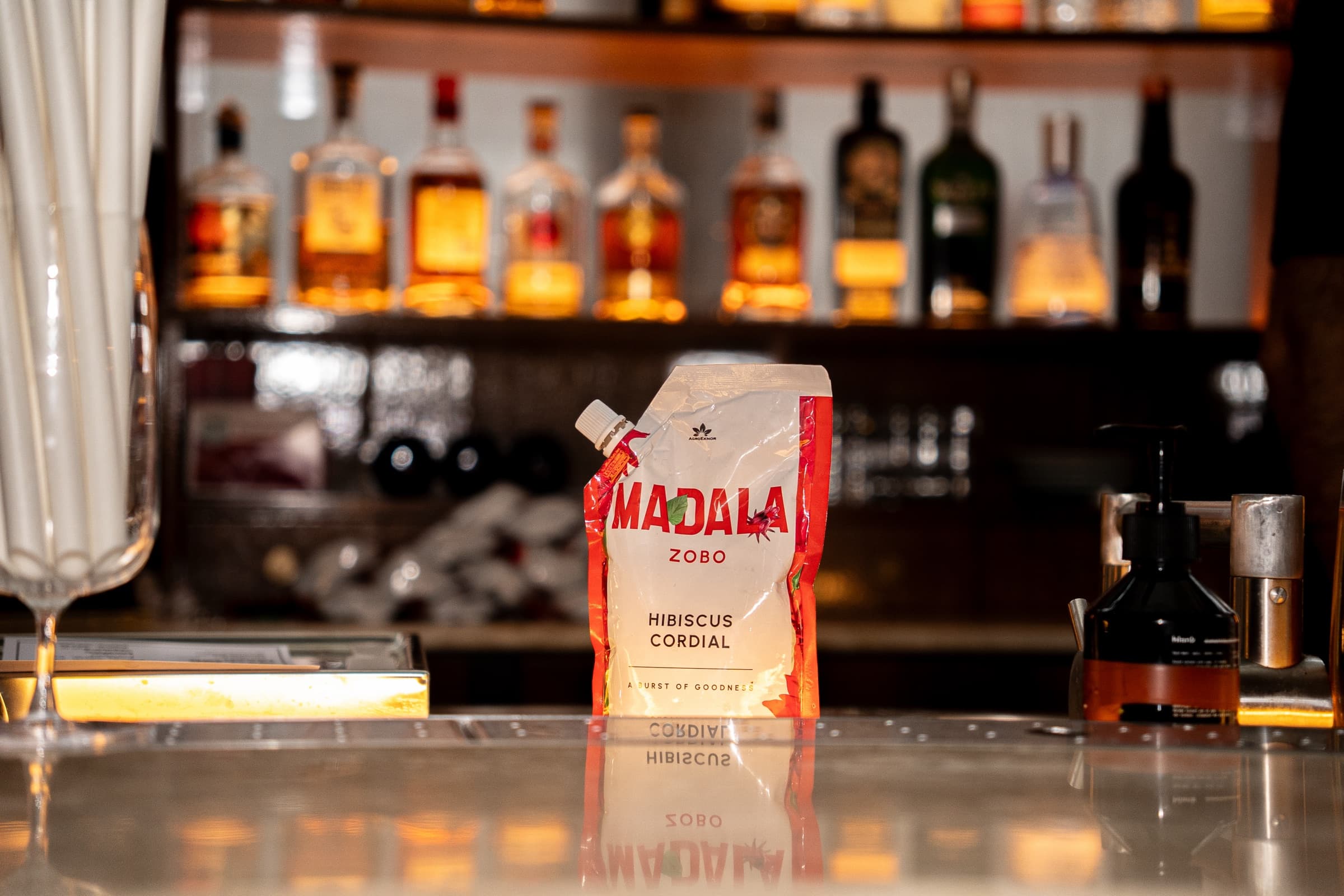 Product photograph of Madala Zobo hibiscus cordial on a bar